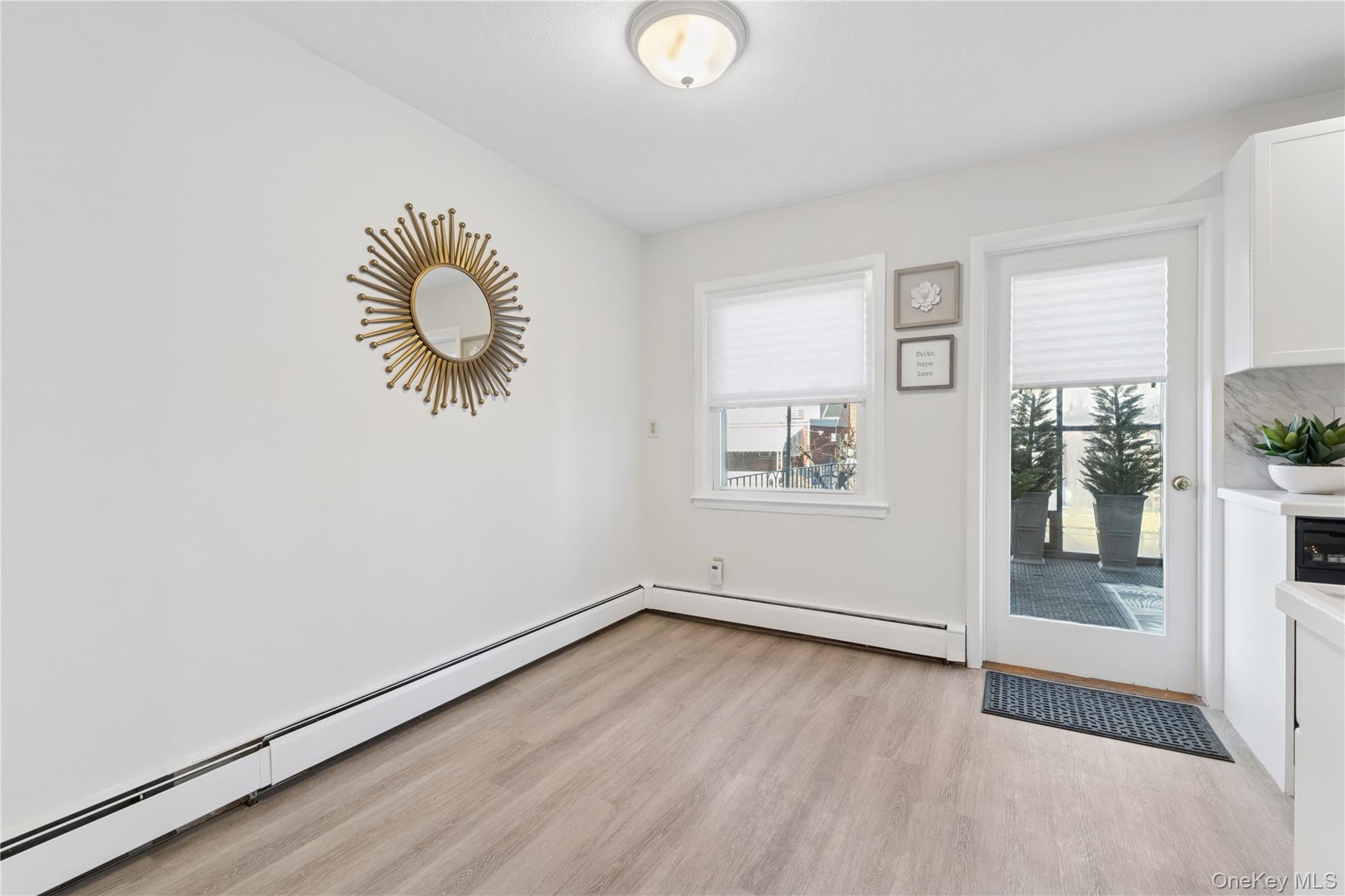 154-27 20th Road Queens, NY 11357 - Photo 12 of 30 a view of room with window and wooden floor
