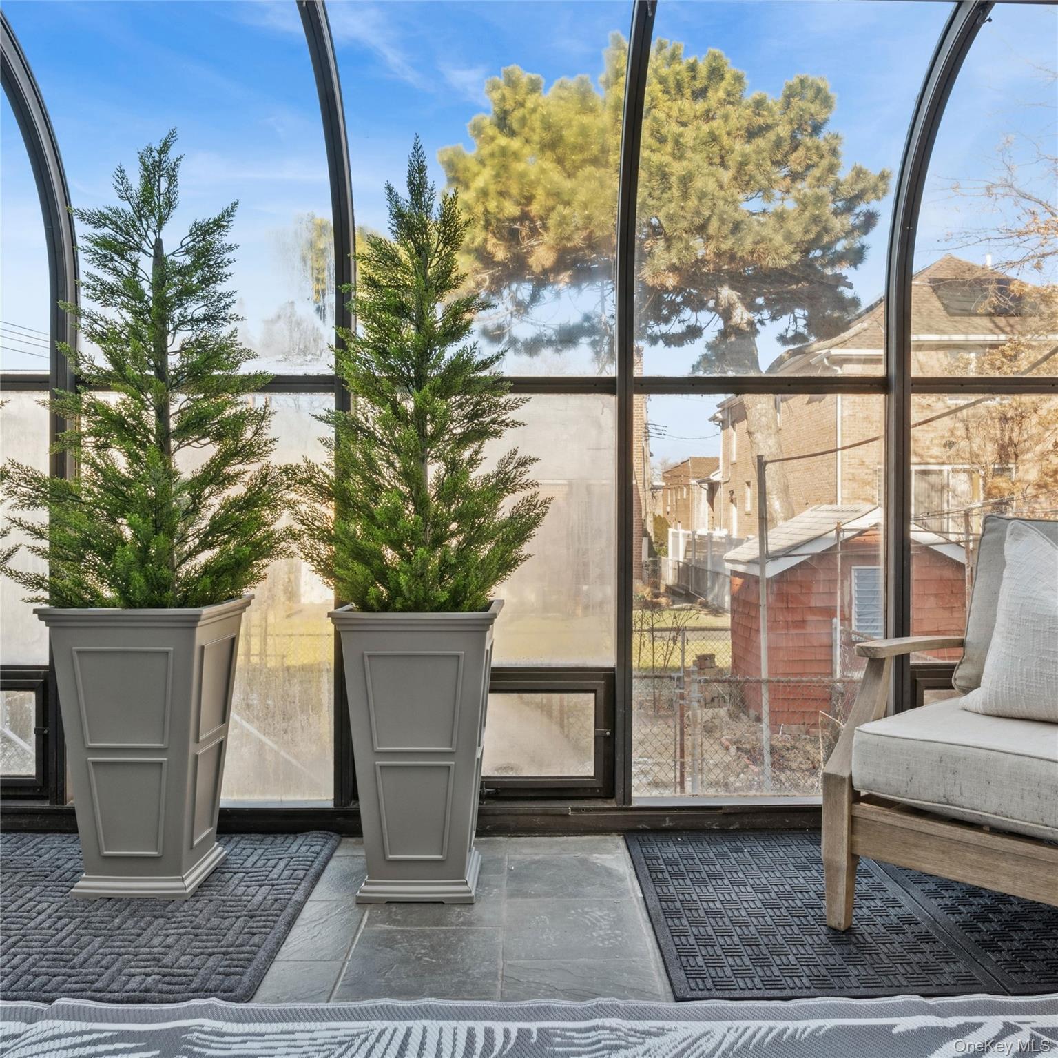 154-27 20th Road Queens, NY 11357 - Photo 13 of 30 a view of a porch with a tree