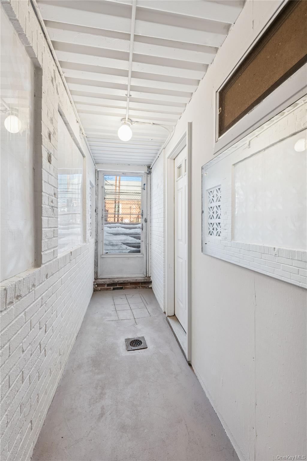 154-27 20th Road Queens, NY 11357 - Photo 28 of 30 a view of entryway with front door