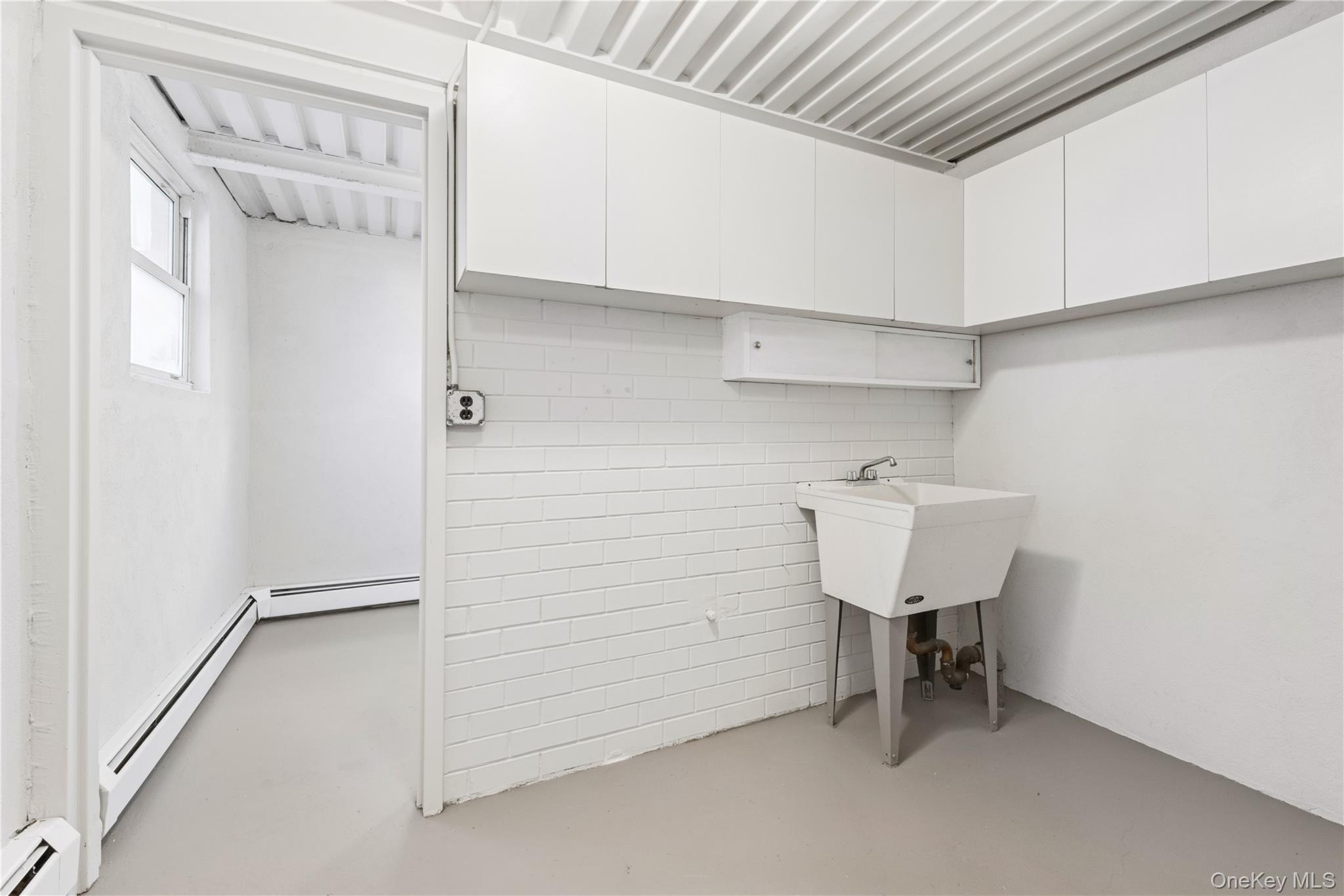 154-27 20th Road Queens, NY 11357 - Photo 29 of 30 a view of a room with shelf