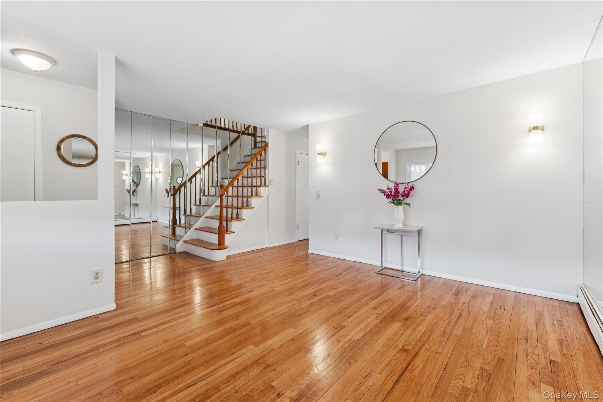 154-27 20th Road Queens, NY 11357 - Photo 7 of 30 a view of a room with wooden floor and window