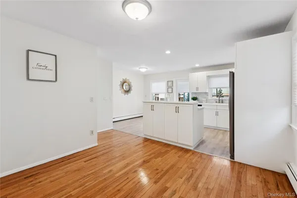 a view of kitchen with wooden floor