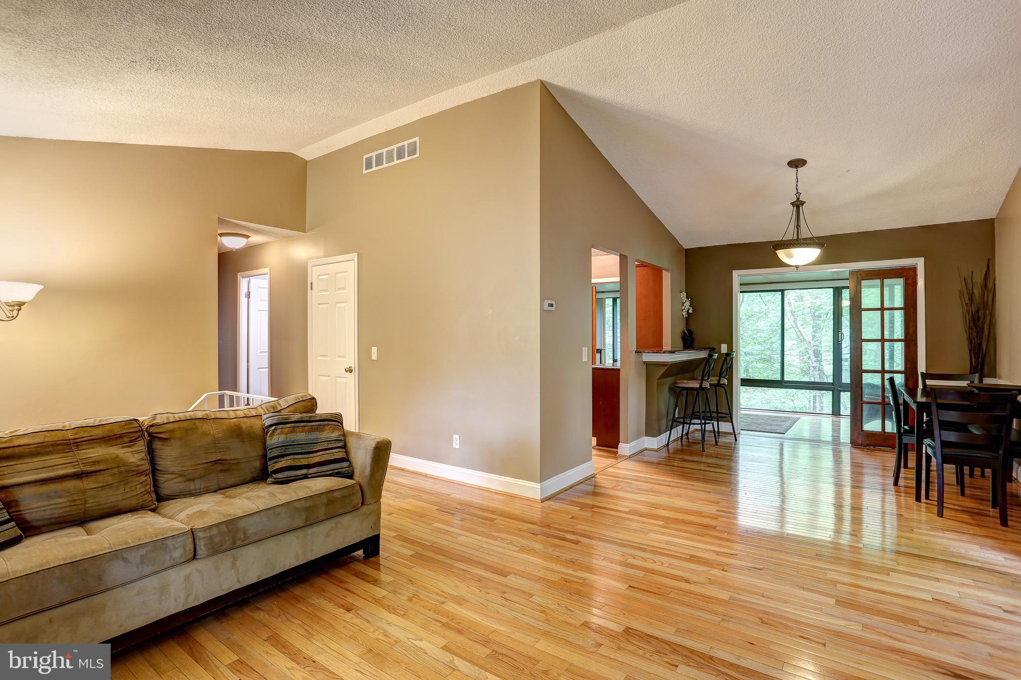 5401 Lightning View Road Columbia, MD 21045 - Photo 6 of 36 Open LR to DR, Vaulted Ceiling, Hardwood Floors