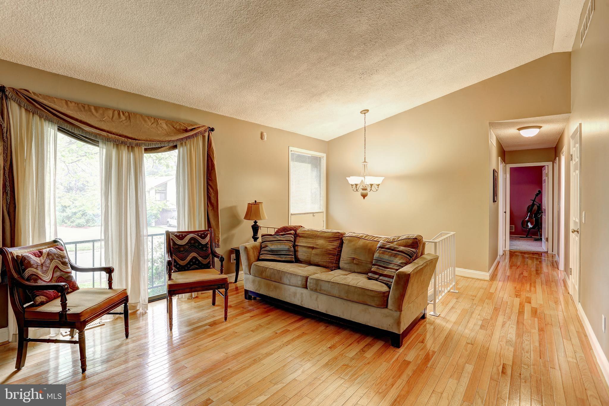 5401 Lightning View Road Columbia, MD 21045 - Photo 7 of 36 Gleaming Hardwood Floors