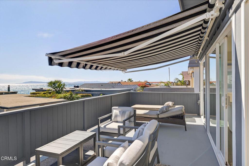 4229 Faria Road Ventura, CA 93001 - Photo 21 of 47 a roof deck with a table and chairs