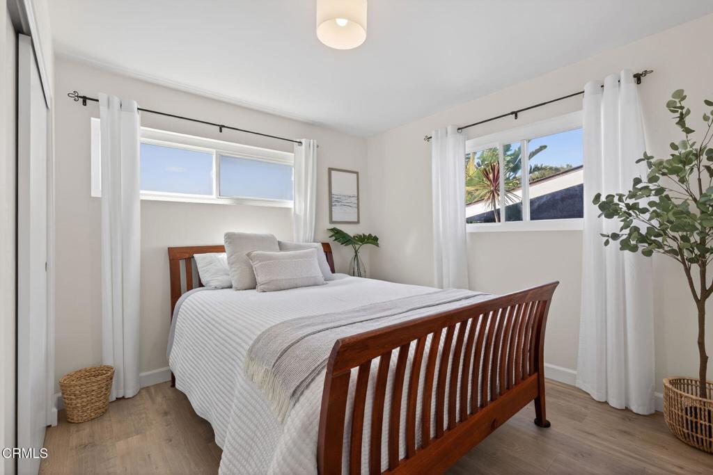 4229 Faria Road Ventura, CA 93001 - Photo 25 of 47 a bedroom with a bed and a painting on the wall