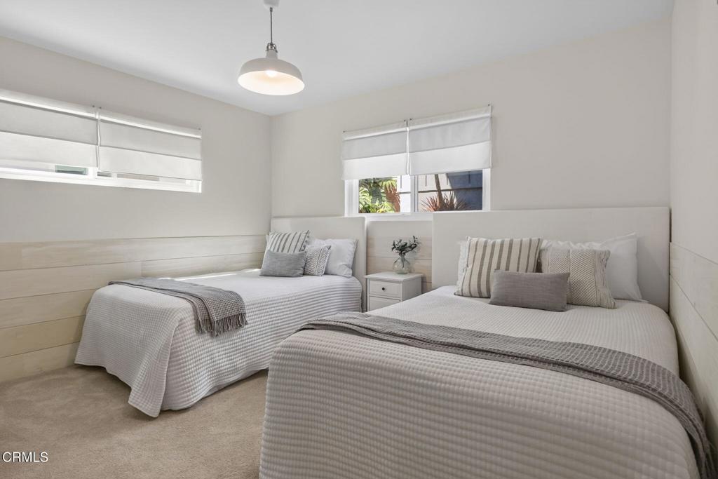 4229 Faria Road Ventura, CA 93001 - Photo 28 of 47 a bedroom with two beds and a window
