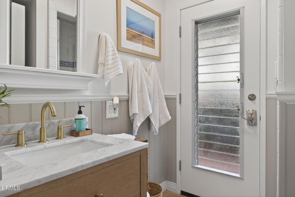 4229 Faria Road Ventura, CA 93001 - Photo 29 of 47 a bathroom with a sink and a mirror