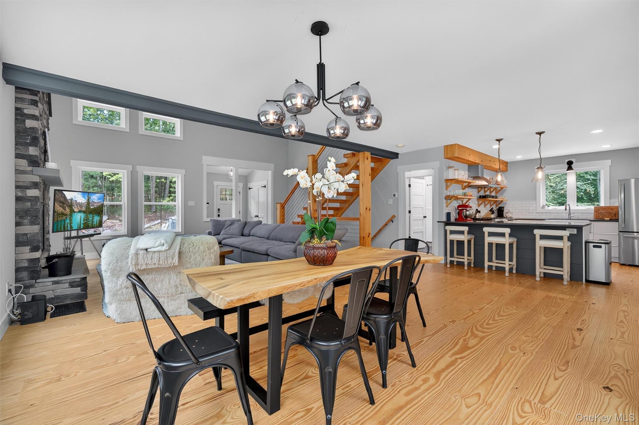 107 Maple Lane Narrowsburg, NY 12764 - Photo 12 of 49 a view of a dining room with furniture and wooden floor