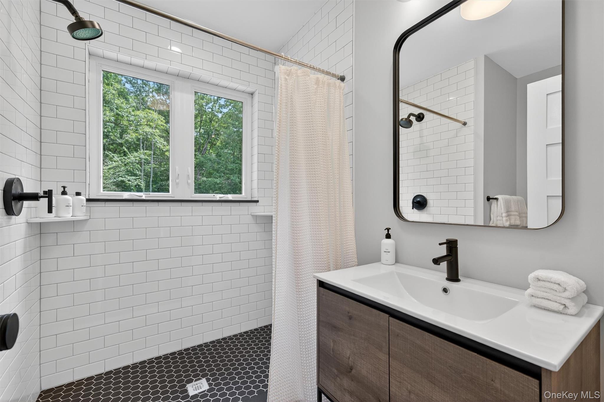 107 Maple Lane Narrowsburg, NY 12764 - Photo 20 of 49 a bathroom with a sink and a mirror