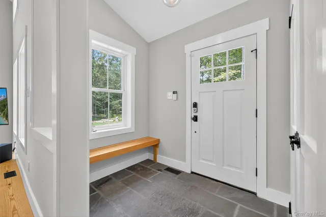 a room that has a window and a bath tub