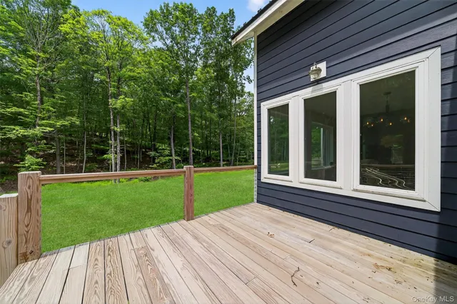 a view of a balcony with a small deck