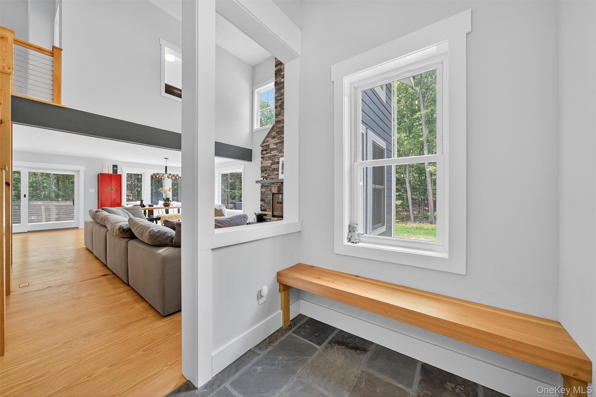 107 Maple Lane Narrowsburg, NY 12764 - Photo 4 of 49 a living room with furniture and windows