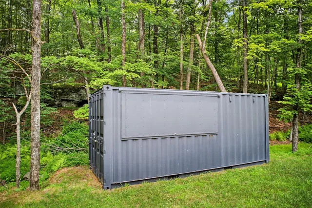 a view of a yard with an outdoor space
