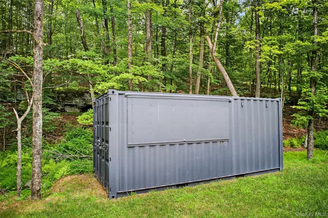 a view of a yard with an outdoor space