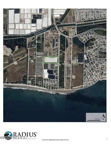 a black and white photo of a black building