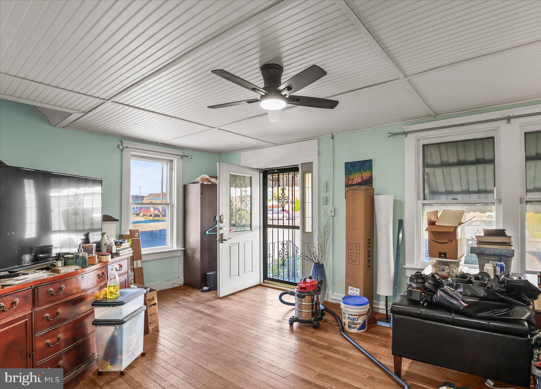 4 Penn Street Hanover, PA 17331 - Photo 4 of 28 Hardwood floor and ceiling fan in living room