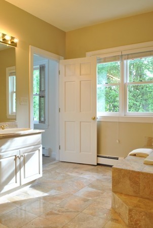 9 Bartkus Farm Concord, MA 01742 - Photo 13 of 19 a view of a livingroom with an empty space and a window