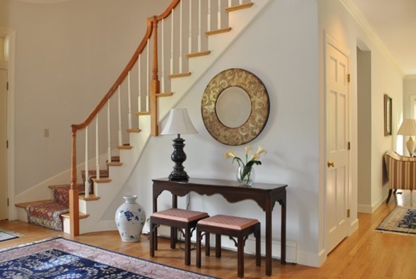 9 Bartkus Farm Concord, MA 01742 - Photo 15 of 19 a view of a hallway with wooden floor and entryway