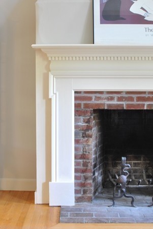 9 Bartkus Farm Concord, MA 01742 - Photo 16 of 19 a close view of a fireplace with wooden floor
