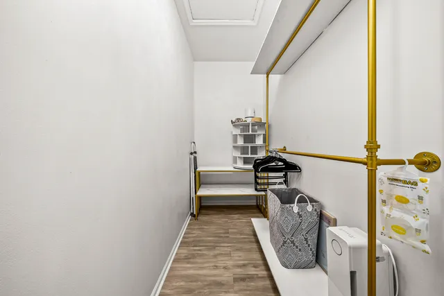 a hallway with a stove top oven