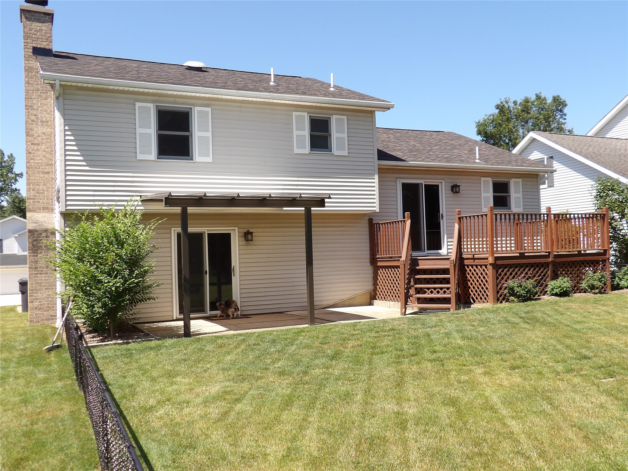 5213 La Rae Drive Erie, PA 16506 - Photo 35 of 46 Rear view of deck and covered patio.
