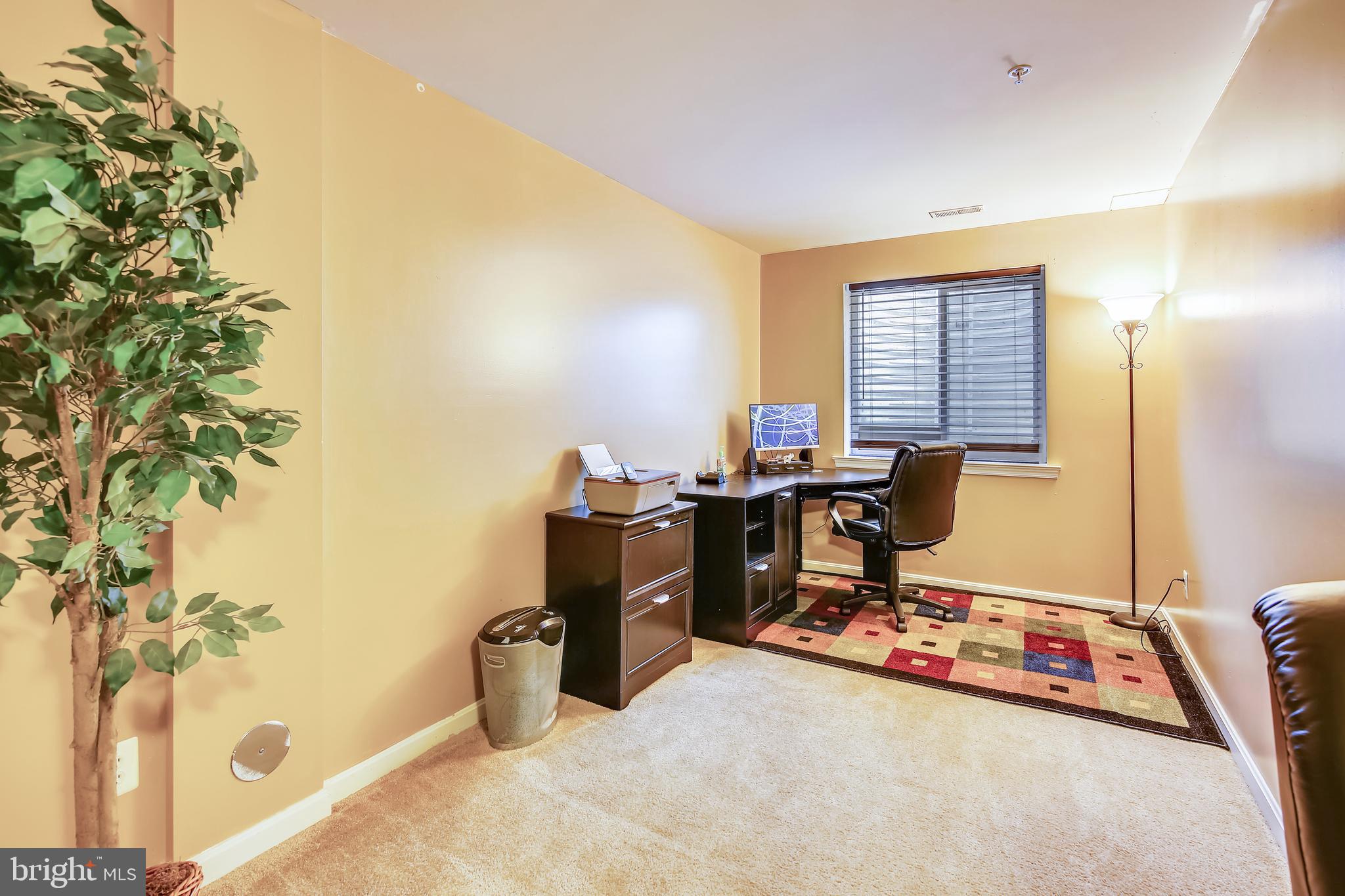 1924 Waltman Road Edgewood, MD 21040 - Photo 29 of 33 a view of a workspace with furniture and a window