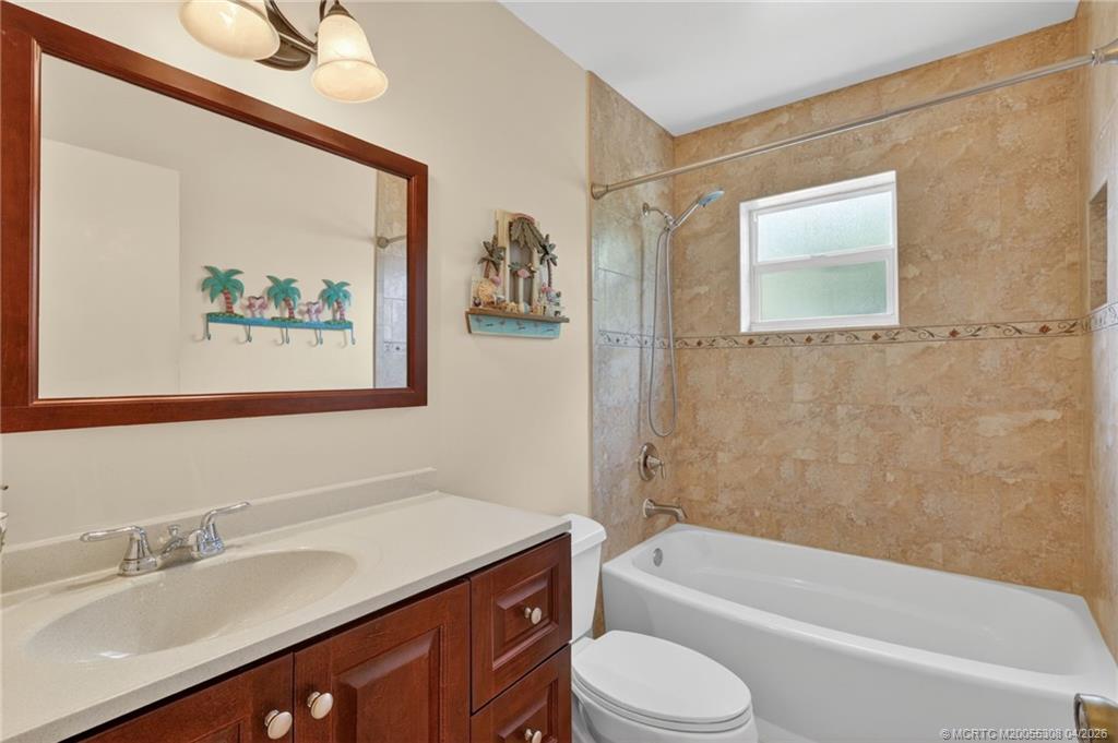 330 Southwest Winnachee Drive Stuart, FL 34994 - Photo 20 of 49 One of two full bathrooms.