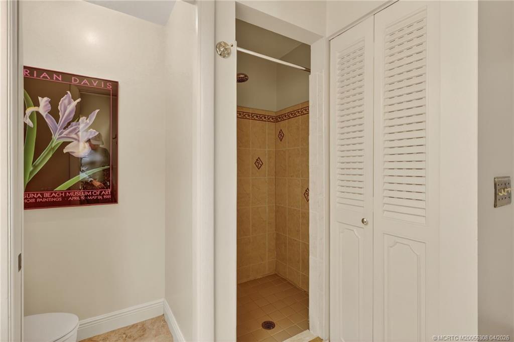 330 Southwest Winnachee Drive Stuart, FL 34994 - Photo 26 of 49 Primary en suite bathroom.