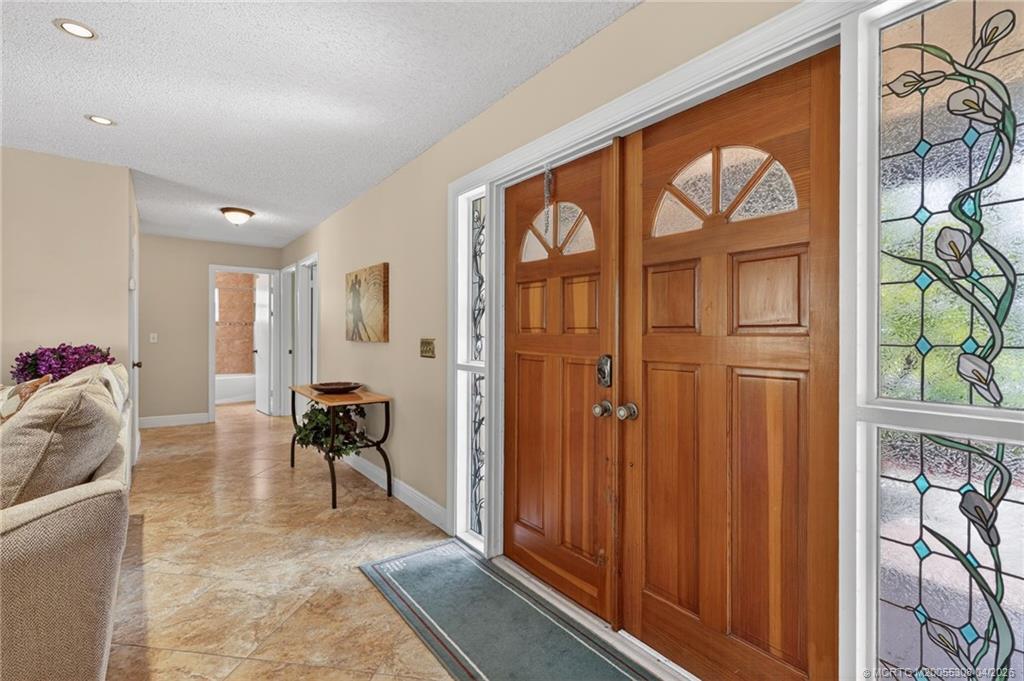330 Southwest Winnachee Drive Stuart, FL 34994 - Photo 3 of 49 Spacious, inviting entryway.