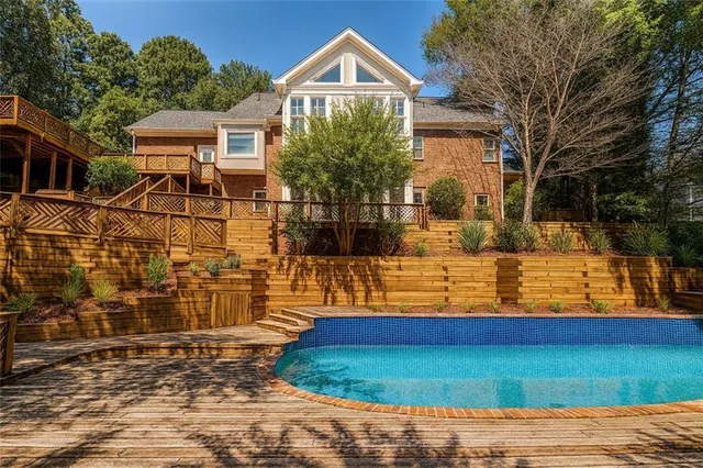 $849,999 | 4070 Runnymede Drive Southwest, Lilburn, GA 30047