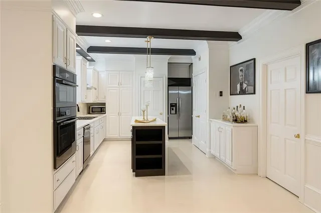 $849,999 | 4070 Runnymede Drive Southwest, Lilburn, GA 30047