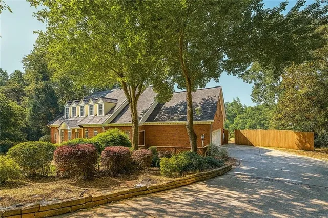 $849,999 | 4070 Runnymede Drive Southwest, Lilburn, GA 30047