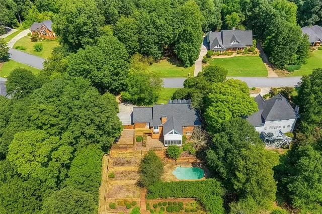 $849,999 | 4070 Runnymede Drive Southwest, Lilburn, GA 30047