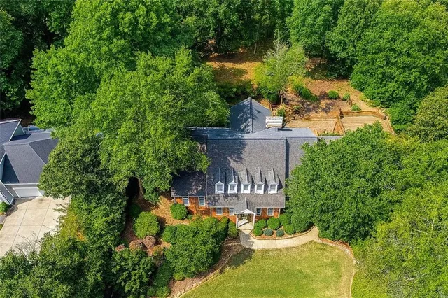 $849,999 | 4070 Runnymede Drive Southwest, Lilburn, GA 30047