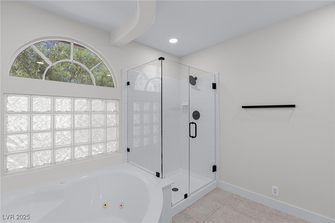 9591 Antelope Bend Court Las Vegas, NV 89148 - Photo 35 of 56 Full bath with a shower stall, a jetted tub, light tile patterned floors, and recessed lighting