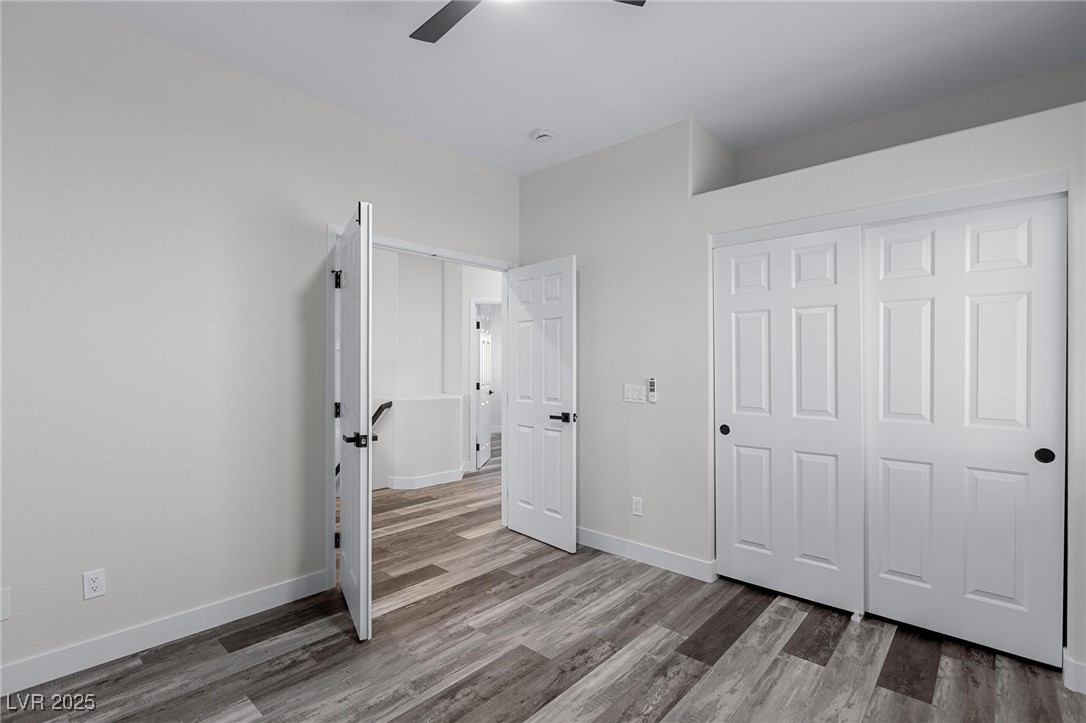9591 Antelope Bend Court Las Vegas, NV 89148 - Photo 41 of 56 Unfurnished bedroom featuring light wood-style flooring, a closet, and ceiling fan