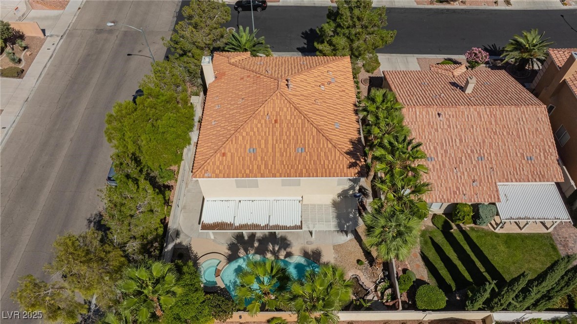 9591 Antelope Bend Court Las Vegas, NV 89148 - Photo 55 of 56 Aerial view of property and surrounding area with a pool area