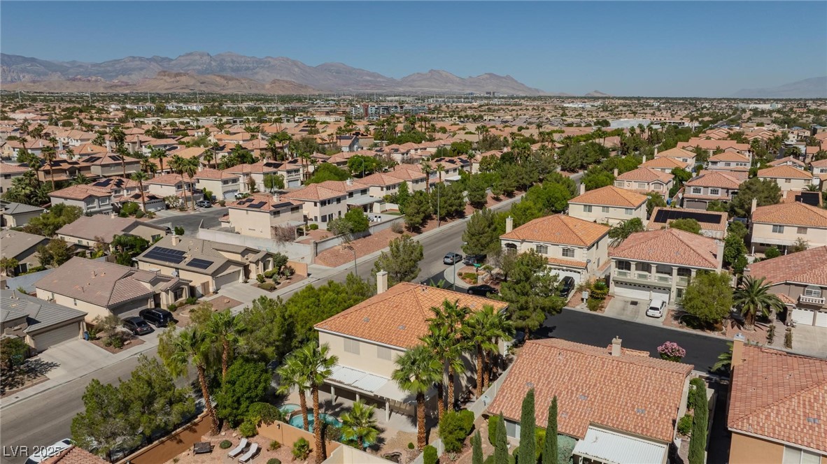 9591 Antelope Bend Court Las Vegas, NV 89148 - Photo 56 of 56 Aerial perspective of suburban area featuring a mountain backdrop