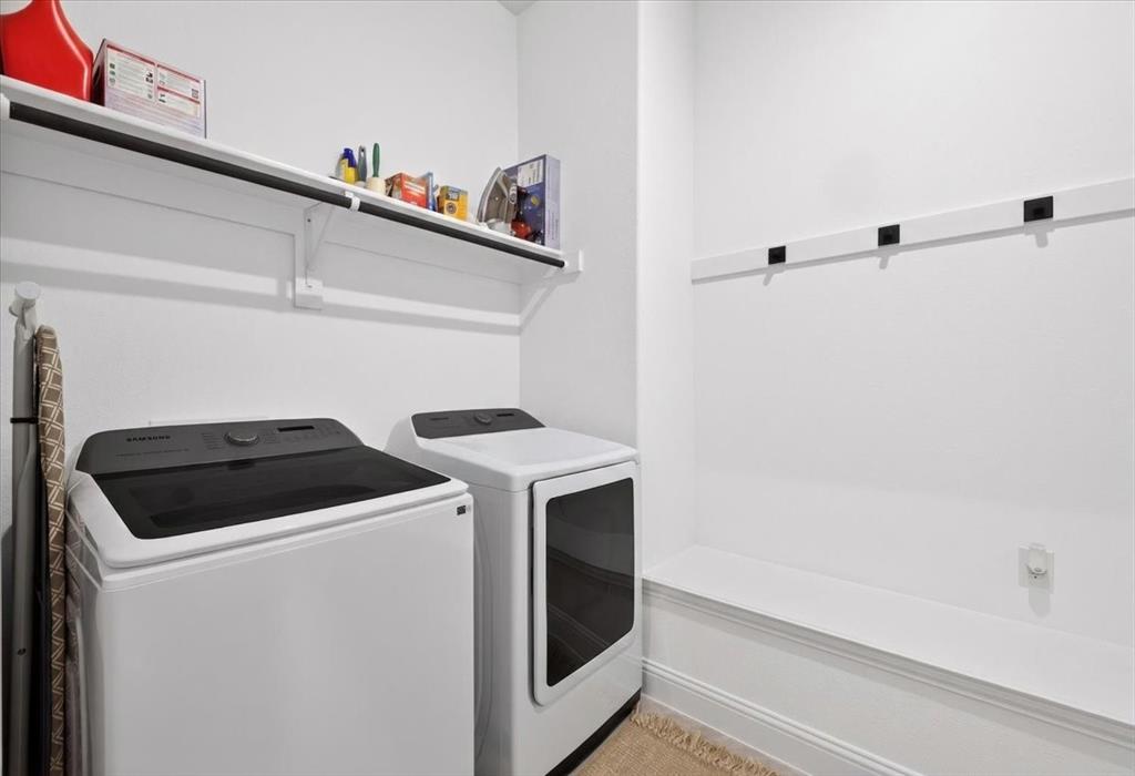 653 Godley Ranch Godley, TX 76044 - Photo 27 of 35 a utility room with dryer and washer