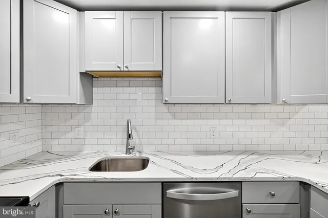 a view of cabinets and sink