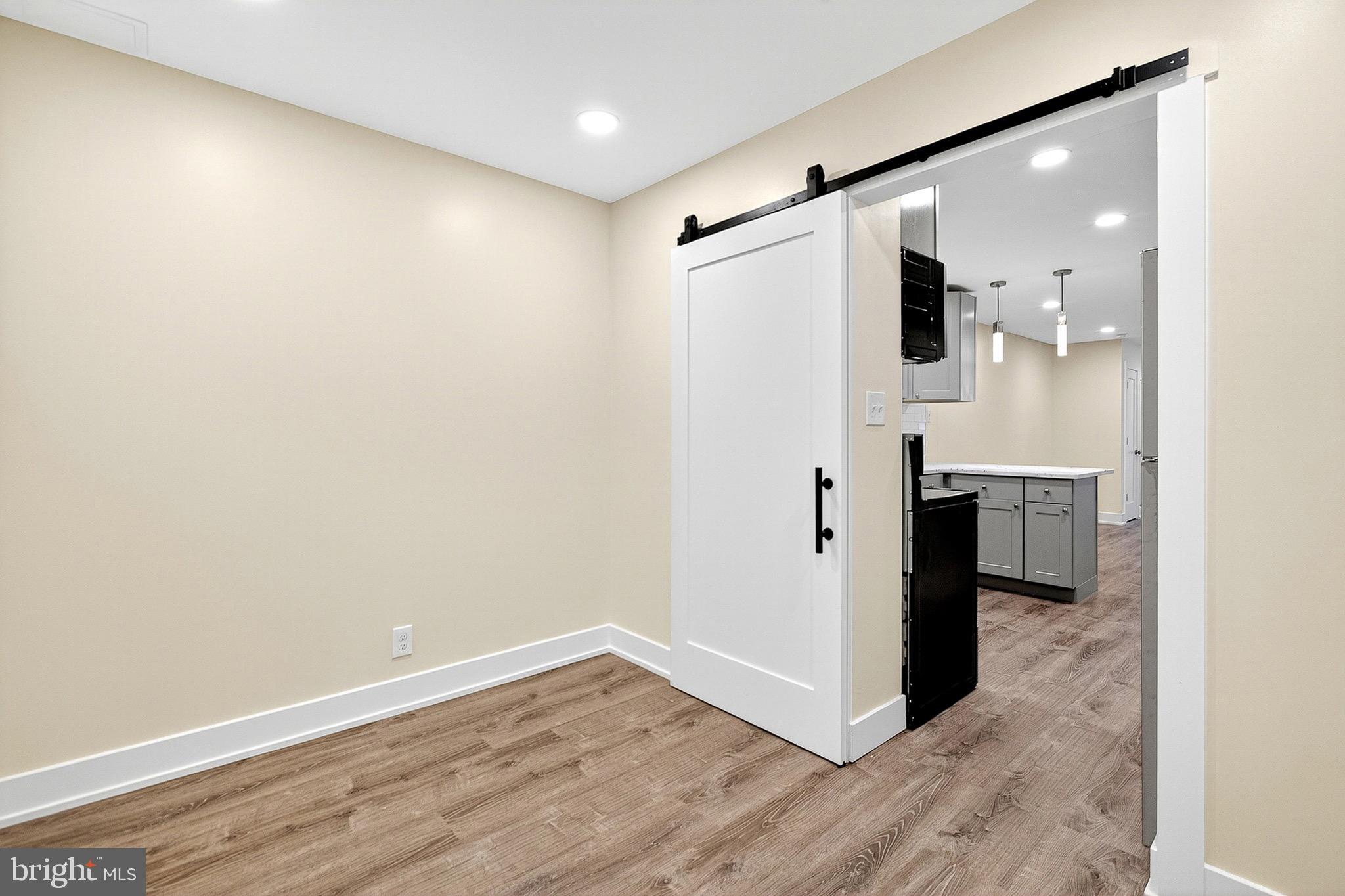 567 Summit House West Chester, PA 19382 - Photo 16 of 31 a view of a hallway with wooden floor