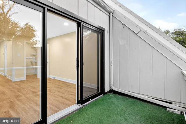 a view of a back yard of the house