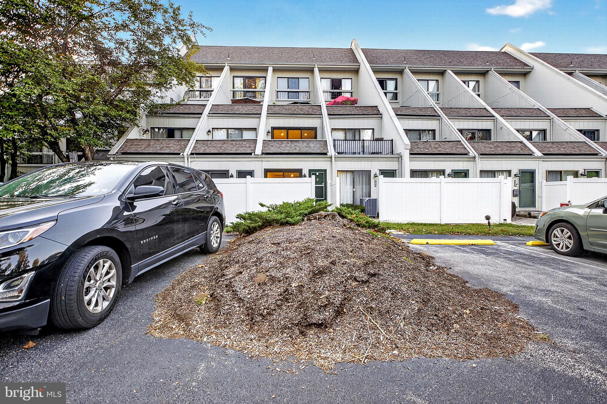 567 Summit House West Chester, PA 19382 - Photo 30 of 31 a view of a car parked in front of a building