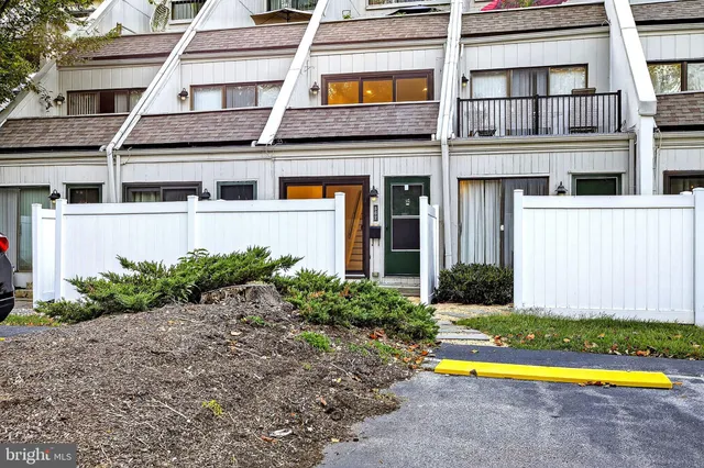 a house that has a big yard in front of it