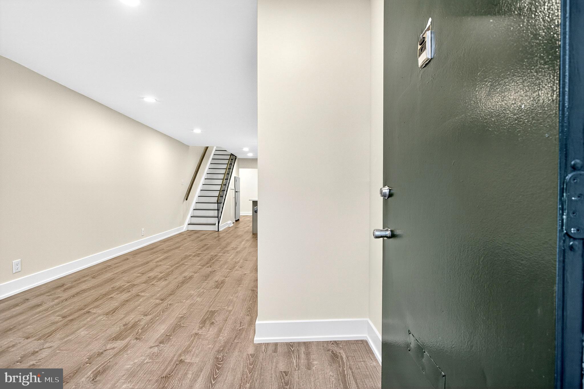 567 Summit House West Chester, PA 19382 - Photo 6 of 31 a view of a hallway with wooden floor