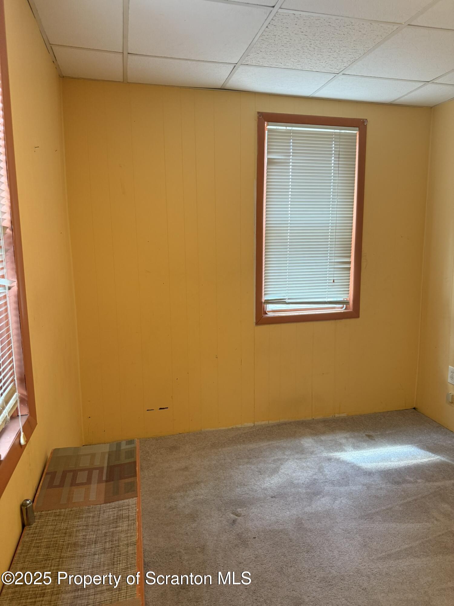 1919 Price Street Scranton, PA 18504 - Photo 19 of 44 a view of an empty room with a window