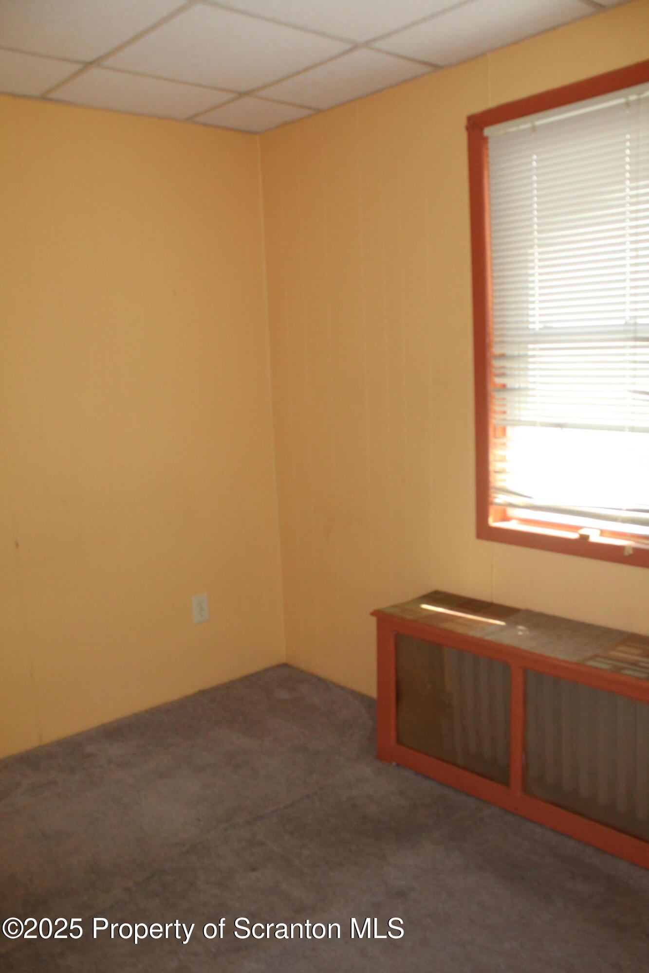 1919 Price Street Scranton, PA 18504 - Photo 20 of 44 a view of an empty room with a window