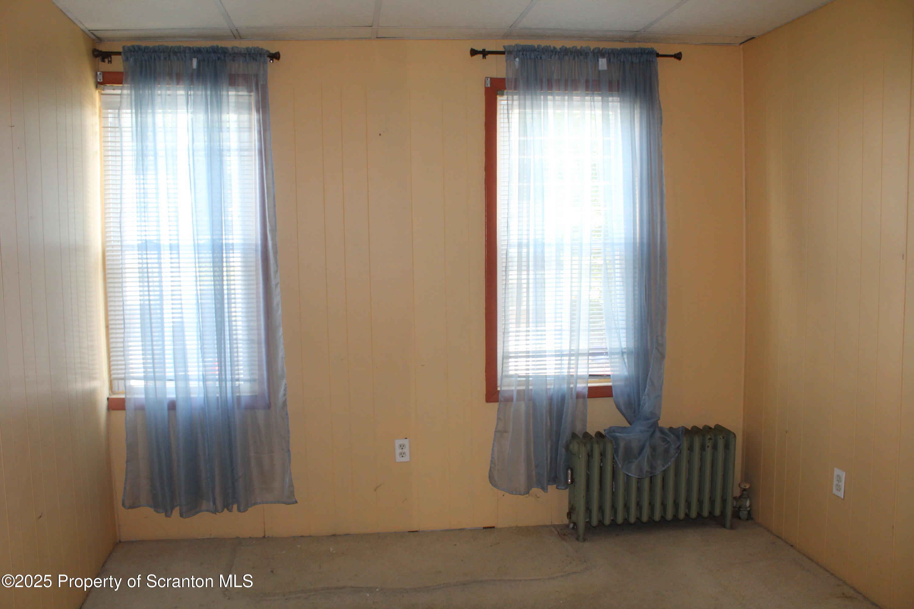 1919 Price Street Scranton, PA 18504 - Photo 26 of 44 a room with windows and stairs