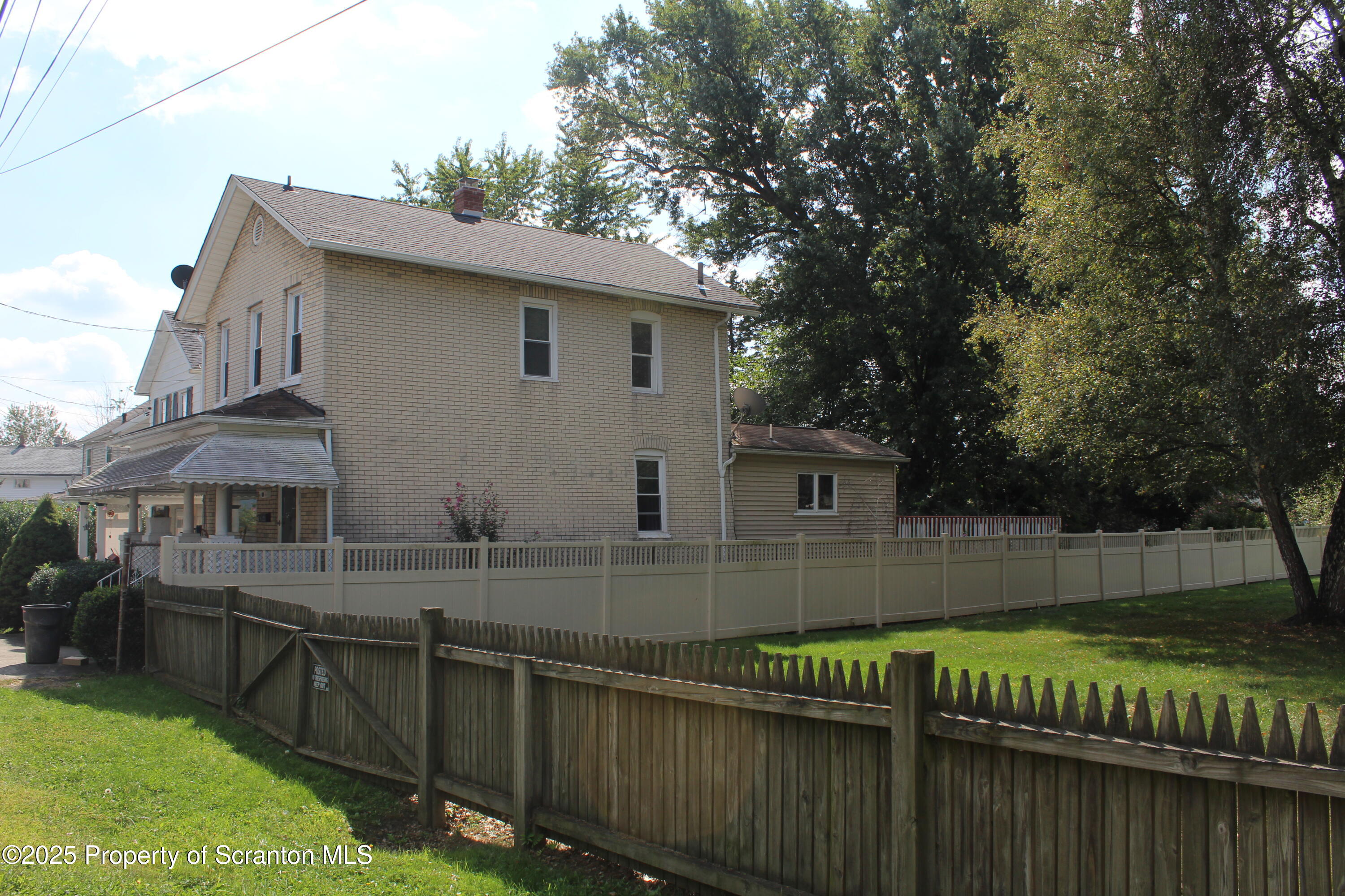 1919 Price Street Scranton, PA 18504 - Photo 38 of 44 a view of backyard with outdoor seating and barbeque oven